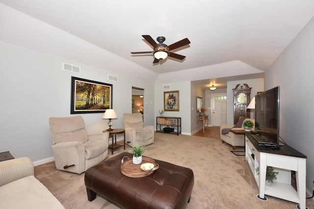 504 Sand Dr, West Bend, WI 53095 - living room featuring light colored carpet, a ceiling fan, and baseboards