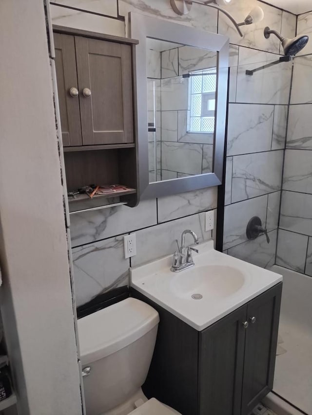 4507 S Griffin Ave, Milwaukee, WI 53207 - full bath featuring a tile shower, vanity, toilet, and tile walls