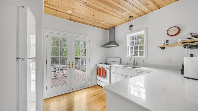 5515 Evergreen Dr, Sheboygan, WI 53081 - kitchen with wall chimney exhaust hood, white appliances, a sink, wood ceiling, and french doors