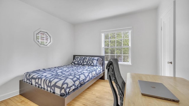 5515 Evergreen Dr, Sheboygan, WI 53081 - bedroom featuring wood finished floors and baseboards