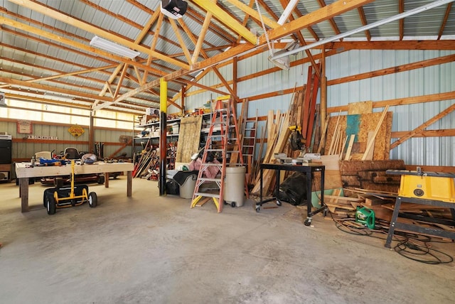 6560 US Highway 14, Arena, WI 53503 - garage featuring a workshop area, metal wall, and a garage door opener