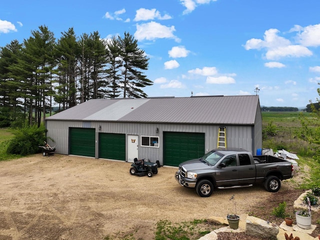 6560 US Highway 14, Arena, WI 53503 - detached garage featuring dirt driveway