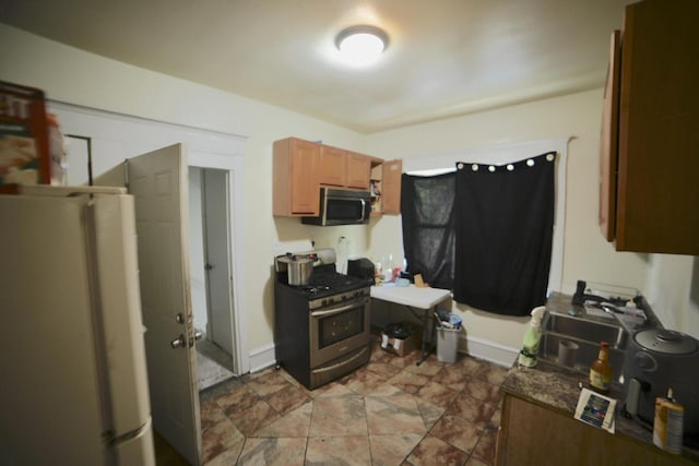 2477 N 37th St Unit 2479, Milwaukee, WI 53210 - kitchen with stainless steel appliances and dark countertops