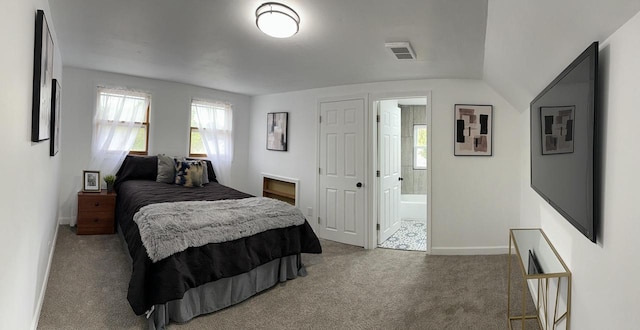 901 S 90th St, West Allis, WI 53214 - carpeted bedroom with baseboards and ensuite bathroom