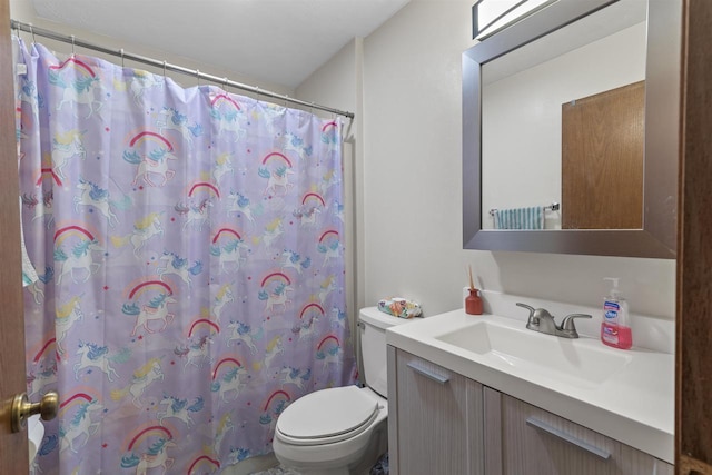 2150 E Carly Ct, Milton, WI 53563 - bathroom featuring vanity, toilet, and a shower with shower curtain