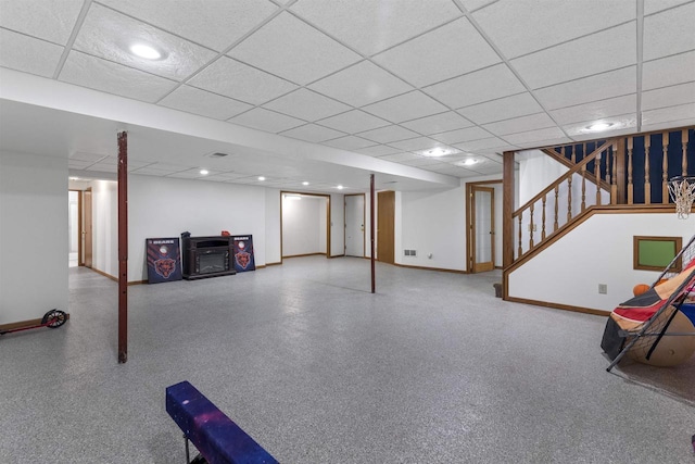 2150 E Carly Ct, Milton, WI 53563 - finished basement with baseboards, stairway, a paneled ceiling, and recessed lighting
