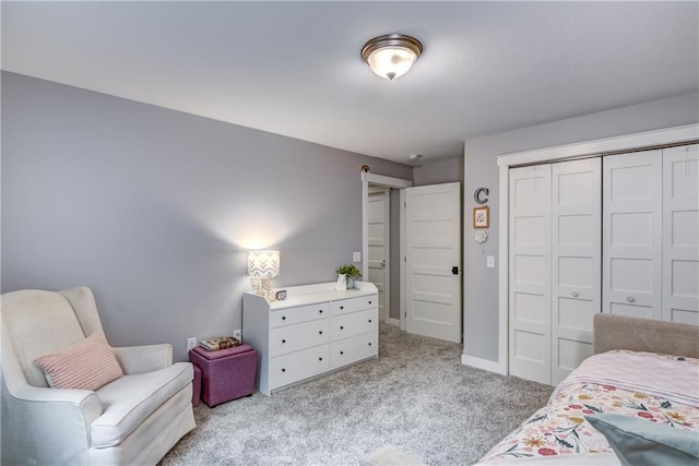 4567 Springfield Dr, Eau Claire, WI 54701 - bedroom featuring light carpet, a closet, and baseboards