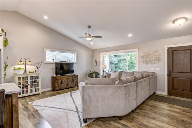4567 Springfield Dr, Eau Claire, WI 54701 - living room featuring lofted ceiling, ceiling fan, wood finished floors, baseboards, and recessed lighting