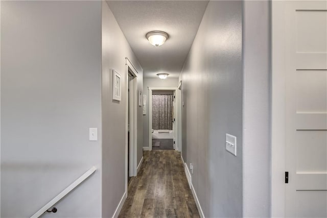 4567 Springfield Dr, Eau Claire, WI 54701 - hall with dark wood-type flooring and baseboards