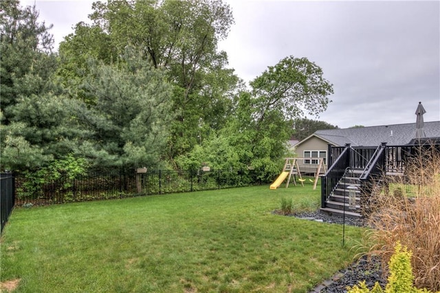 4567 Springfield Dr, Eau Claire, WI 54701 - view of yard with a playground and a wooden deck