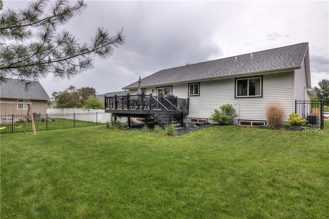 4567 Springfield Dr, Eau Claire, WI 54701 - back of property with a deck, central AC unit, and a shingled roof