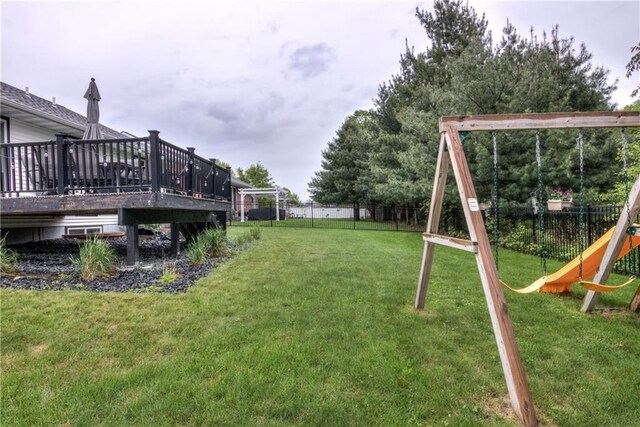 4567 Springfield Dr, Eau Claire, WI 54701 - view of yard featuring a playground and a wooden deck