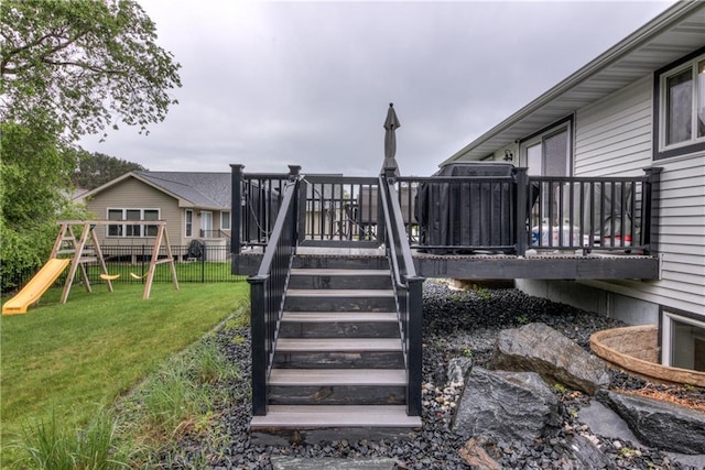 4567 Springfield Dr, Eau Claire, WI 54701 - wooden terrace featuring stairs and a playground