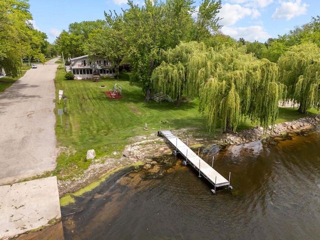 N3510 Lotus Dr, Montello, WI 53949 - dock area featuring a water view and a lawn