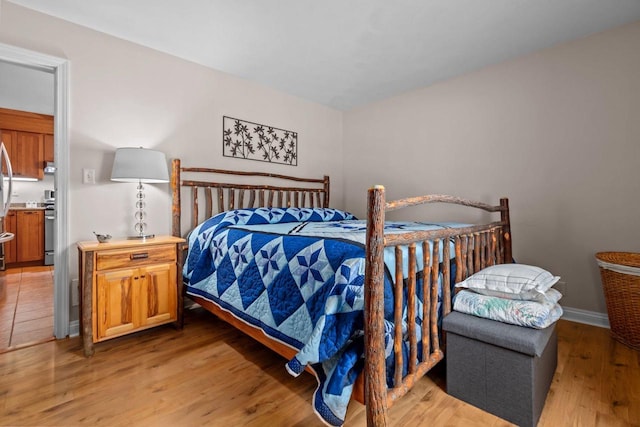 N3510 Lotus Dr, Montello, WI 53949 - bedroom with light wood finished floors and baseboards