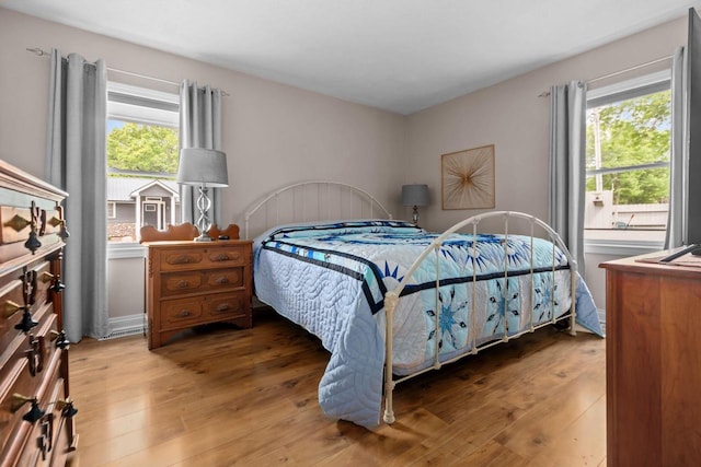 N3510 Lotus Dr, Montello, WI 53949 - bedroom with hardwood / wood-style floors and multiple windows
