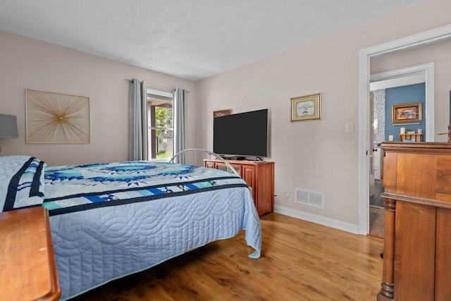 N3510 Lotus Dr, Montello, WI 53949 - bedroom with light wood-style flooring and baseboards