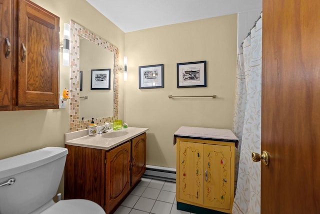 N3510 Lotus Dr, Montello, WI 53949 - bathroom featuring a baseboard radiator, vanity, tile patterned floors, and toilet