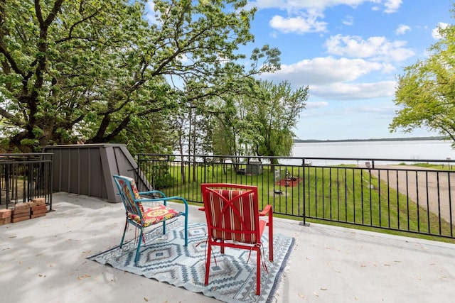 N3510 Lotus Dr, Montello, WI 53949 - view of patio featuring a water view