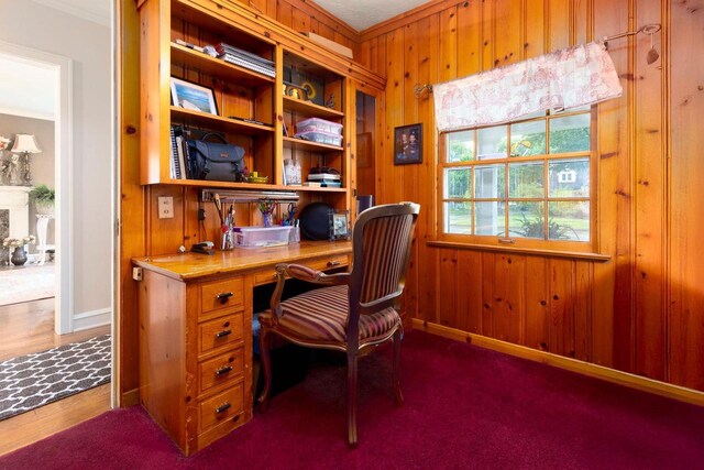 326 W Parkway Blvd, Appleton, WI 54911 - office area featuring crown molding, wooden walls, built in study area, and baseboards