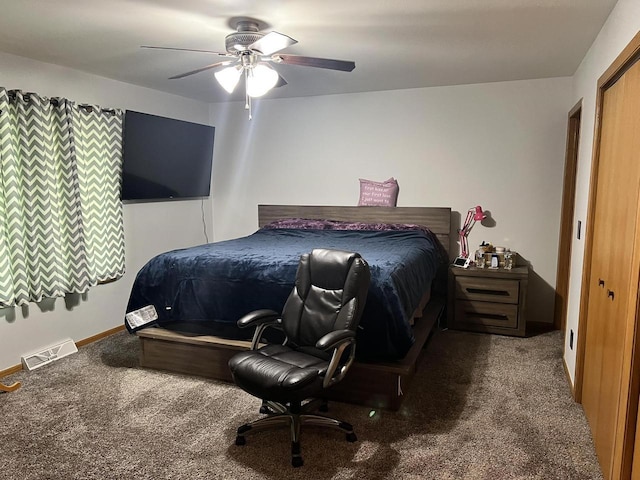 1159 Elmhurst Ln, Oshkosh, WI 54904 - carpeted bedroom with a ceiling fan and baseboards
