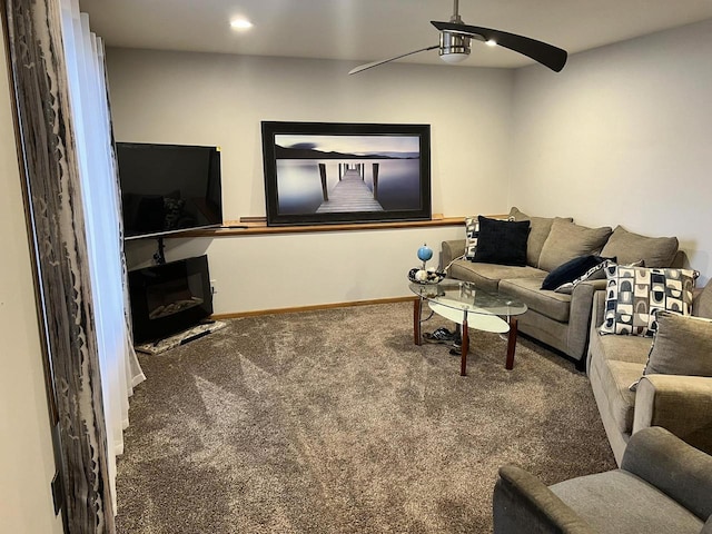 1159 Elmhurst Ln, Oshkosh, WI 54904 - living area with carpet, ceiling fan, baseboards, a glass covered fireplace, and recessed lighting