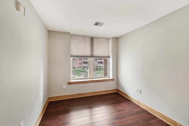 333 W Mifflin St Unit 8100, Madison, WI 53703 - unfurnished room featuring dark wood-style floors and baseboards