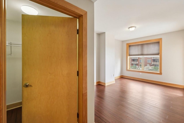 333 W Mifflin St Unit 8100, Madison, WI 53703 - hallway featuring wood finished floors and baseboards