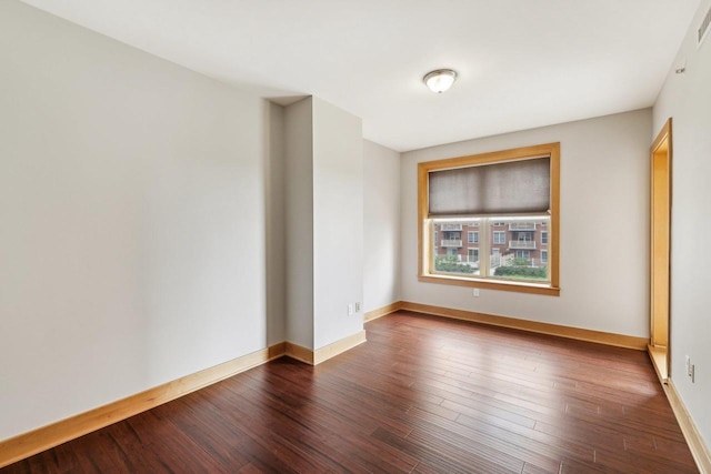 333 W Mifflin St Unit 8100, Madison, WI 53703 - empty room featuring dark wood finished floors and baseboards