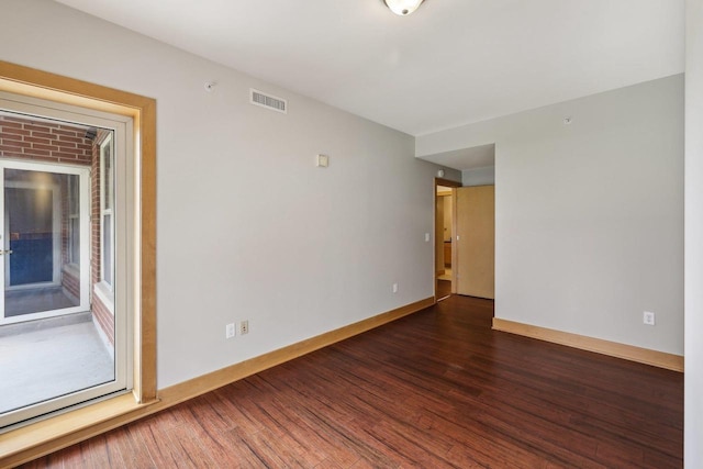 333 W Mifflin St Unit 8100, Madison, WI 53703 - spare room featuring wood finished floors and baseboards