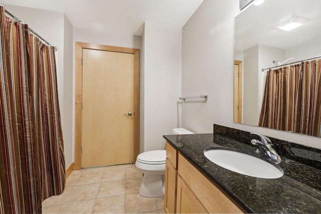 333 W Mifflin St Unit 8100, Madison, WI 53703 - bathroom featuring vanity, toilet, tile patterned floors, and a shower with shower curtain