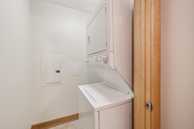 333 W Mifflin St Unit 8100, Madison, WI 53703 - washroom featuring estacked washer and dryer and electric panel