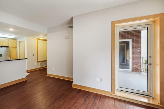 333 W Mifflin St Unit 8100, Madison, WI 53703 - unfurnished room with baseboards and dark wood finished floors