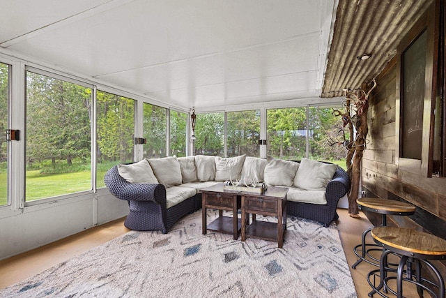 W4593 Old 352 Rd, Stephenson, MI 49887 - sunroom featuring outdoor lounge area, plenty of natural light, and wood finished floors