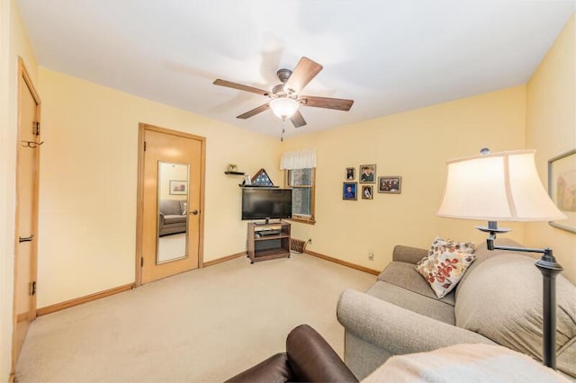 2114 S 81st St, West Allis, WI 53219 - living room with light carpet, ceiling fan, and baseboards
