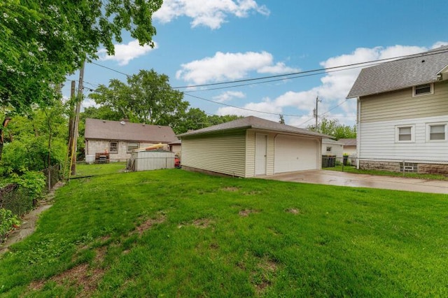2114 S 81st St, West Allis, WI 53219 - view of yard featuring an outbuilding and a detached garage