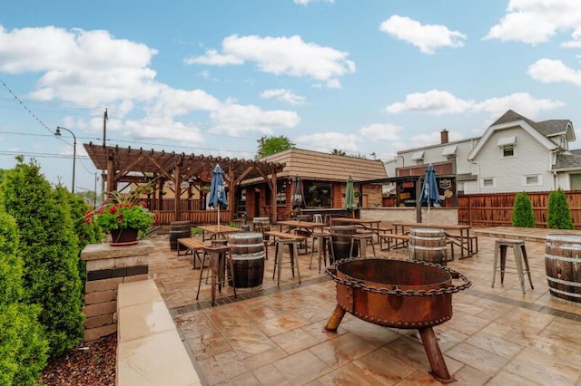 2114 S 81st St, West Allis, WI 53219 - view of patio with an outdoor fire pit and a pergola