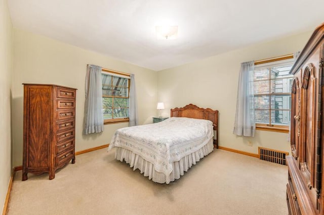 2114 S 81st St, West Allis, WI 53219 - bedroom featuring baseboards and light colored carpet