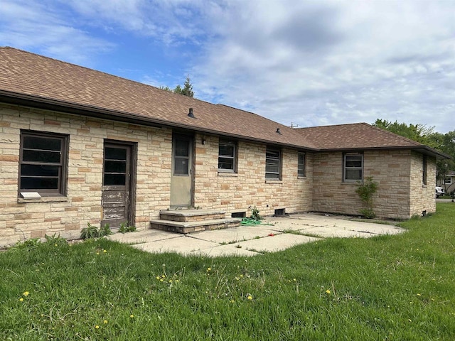 965 Appleton Rd, Menasha, WI 54952 - back of house with roof with shingles, a yard, and a patio