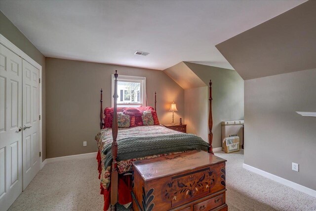 963 W Highland St, Whitewater, WI 53190 - bedroom with carpet floors, baseboards, and vaulted ceiling