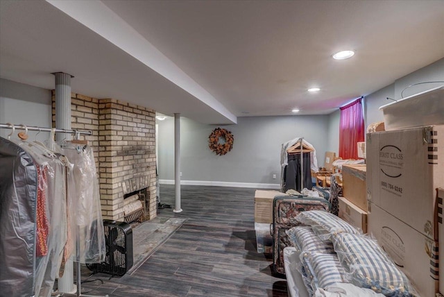 963 W Highland St, Whitewater, WI 53190 - living room featuring wood finished floors, recessed lighting, a brick fireplace, and baseboards