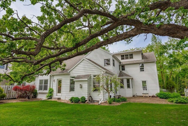 963 W Highland St, Whitewater, WI 53190 - rear view of property with roof with shingles