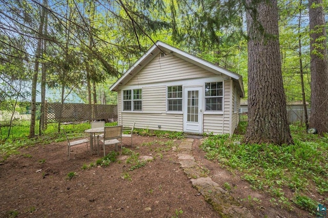 9298 E Park Ave, Solon Springs, WI 54873 - rear view of property with outdoor dining area and an outdoor structure
