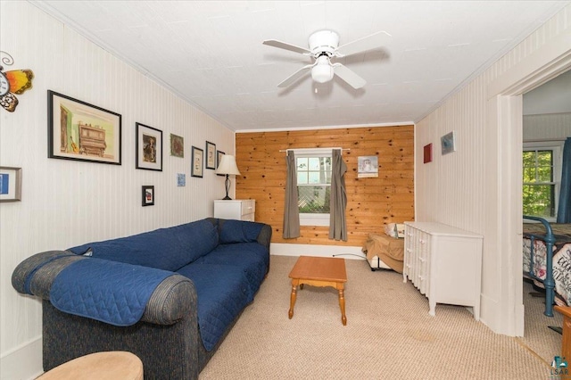 9298 E Park Ave, Solon Springs, WI 54873 - living area with ornamental molding, light carpet, plenty of natural light, and ceiling fan