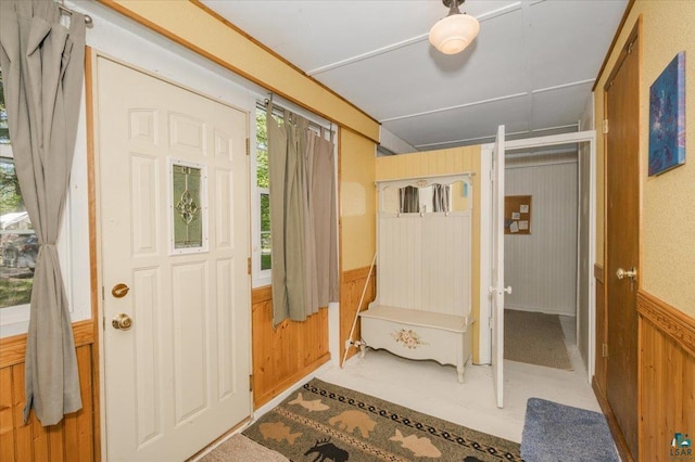 9298 E Park Ave, Solon Springs, WI 54873 - entrance foyer with wood walls and a wainscoted wall