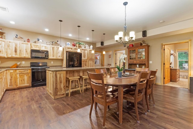 N9281 Perkins Rd, Mindoro, WI 54644 - dining room featuring a chandelier, dark wood finished floors, and recessed lighting
