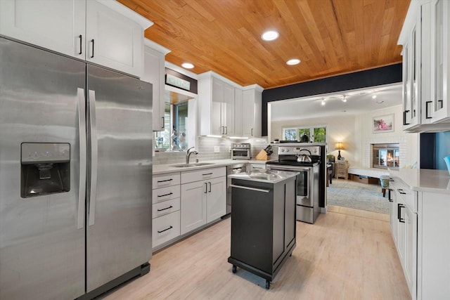 N60W39640 Mary Ln, Oconomowoc, WI 53066 - kitchen featuring stainless steel appliances, wood ceiling, light wood-style flooring, white cabinets, and recessed lighting