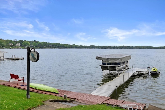 N60W39640 Mary Ln, Oconomowoc, WI 53066 - dock with a water view and boat lift