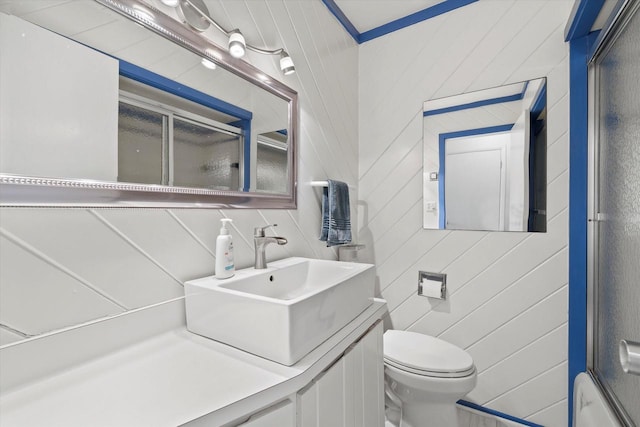 N60W39640 Mary Ln, Oconomowoc, WI 53066 - bathroom with an enclosed shower, vanity, and toilet