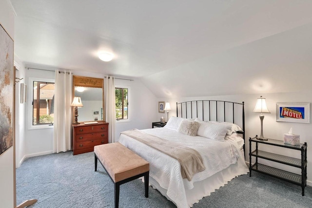 N60W39640 Mary Ln, Oconomowoc, WI 53066 - bedroom featuring carpet floors, lofted ceiling, and baseboards